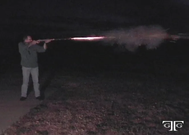 A man is holding a light up stick