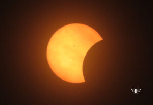A partial solar eclipse is seen in this picture.