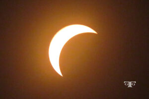 A partial solar eclipse is seen in this picture.