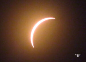 A partial solar eclipse is seen in this picture.