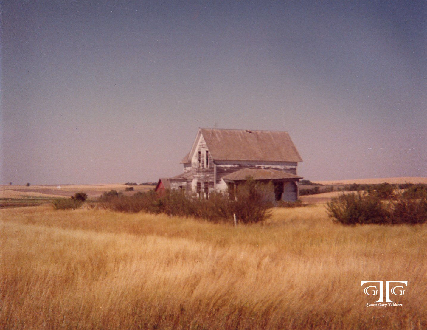 A house in the middle of nowhere with no one inside.