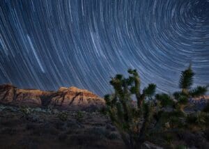 A star trail photo of the night sky.