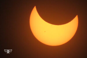 A partial solar eclipse is seen in this picture.