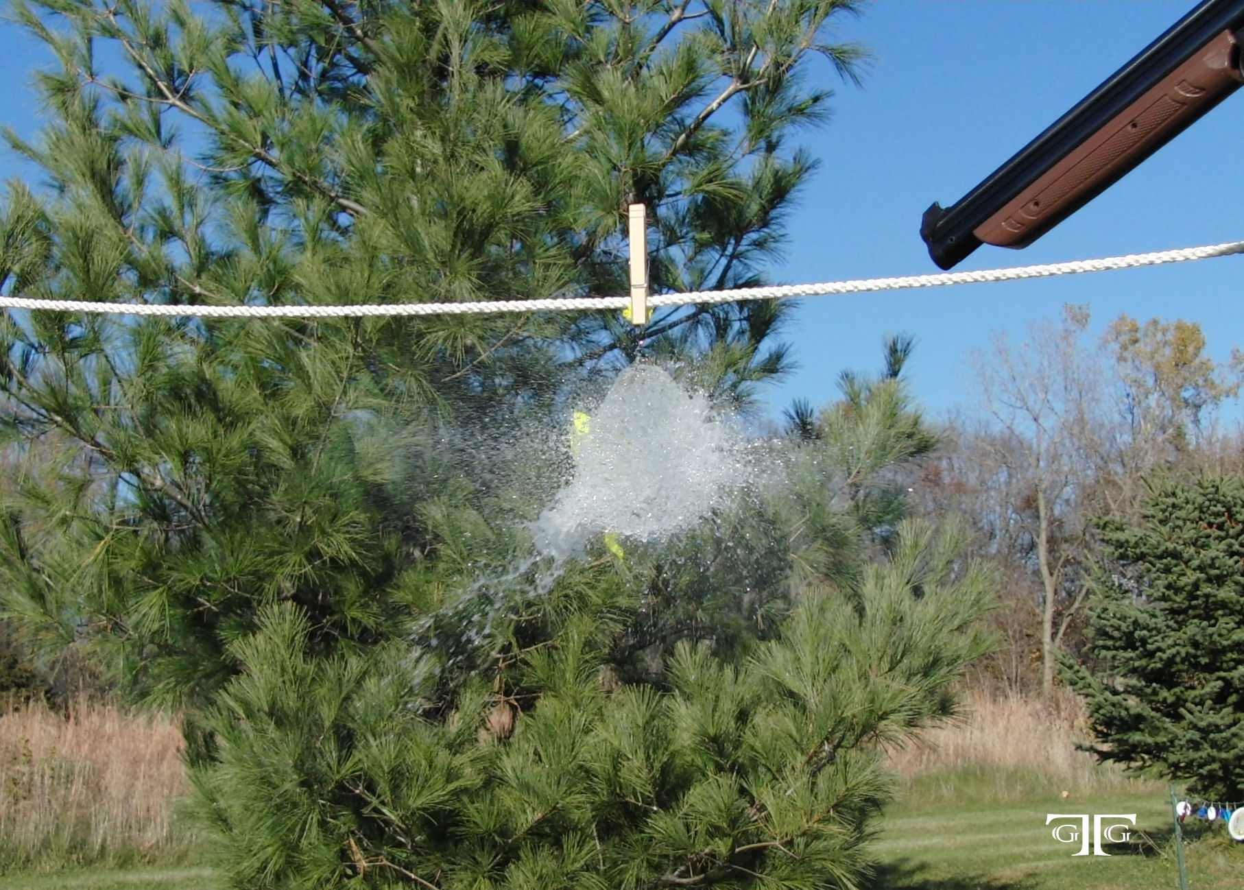 3rd Balloon - CIMG4591 Cropped 5x7 with GTG Lo A person hanging clothes on a line